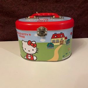 HELLO KITTY: EC, Oval Tin train case/sewing box with latch.